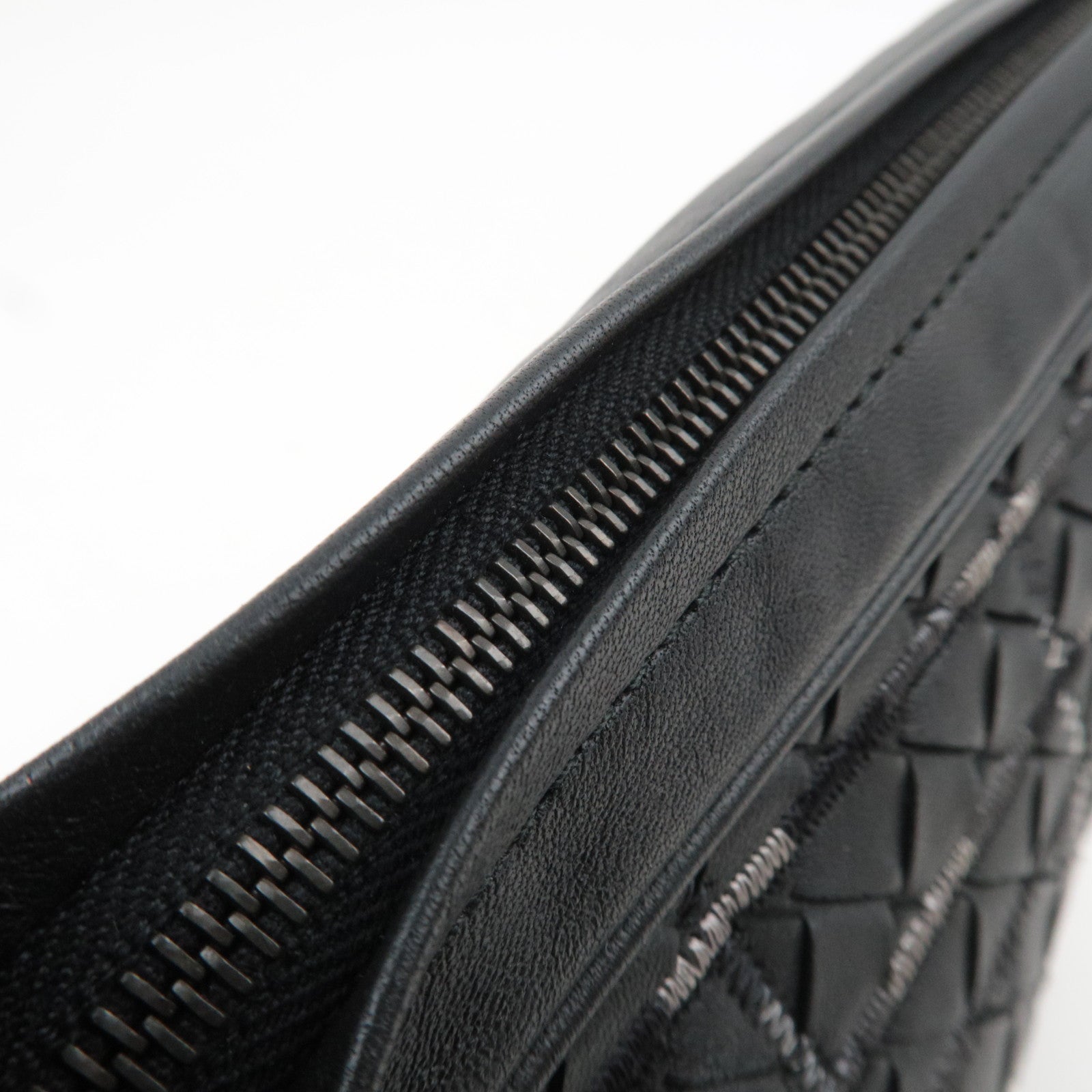 BOTTEGA VENETA Intrecciato Leather Clutch Bag with Stitching details