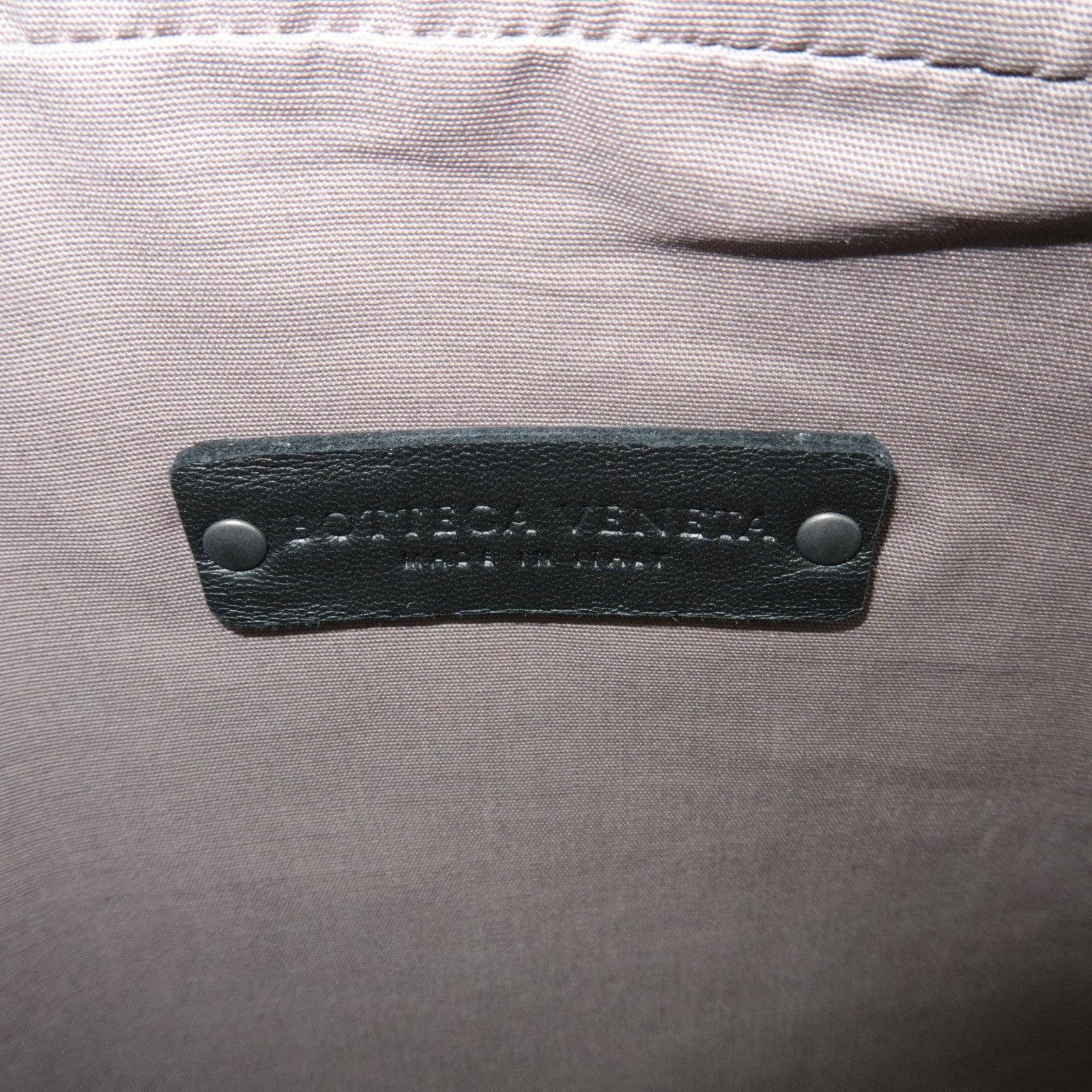 BOTTEGA VENETA Intrecciato Leather Clutch Bag with Stitching details