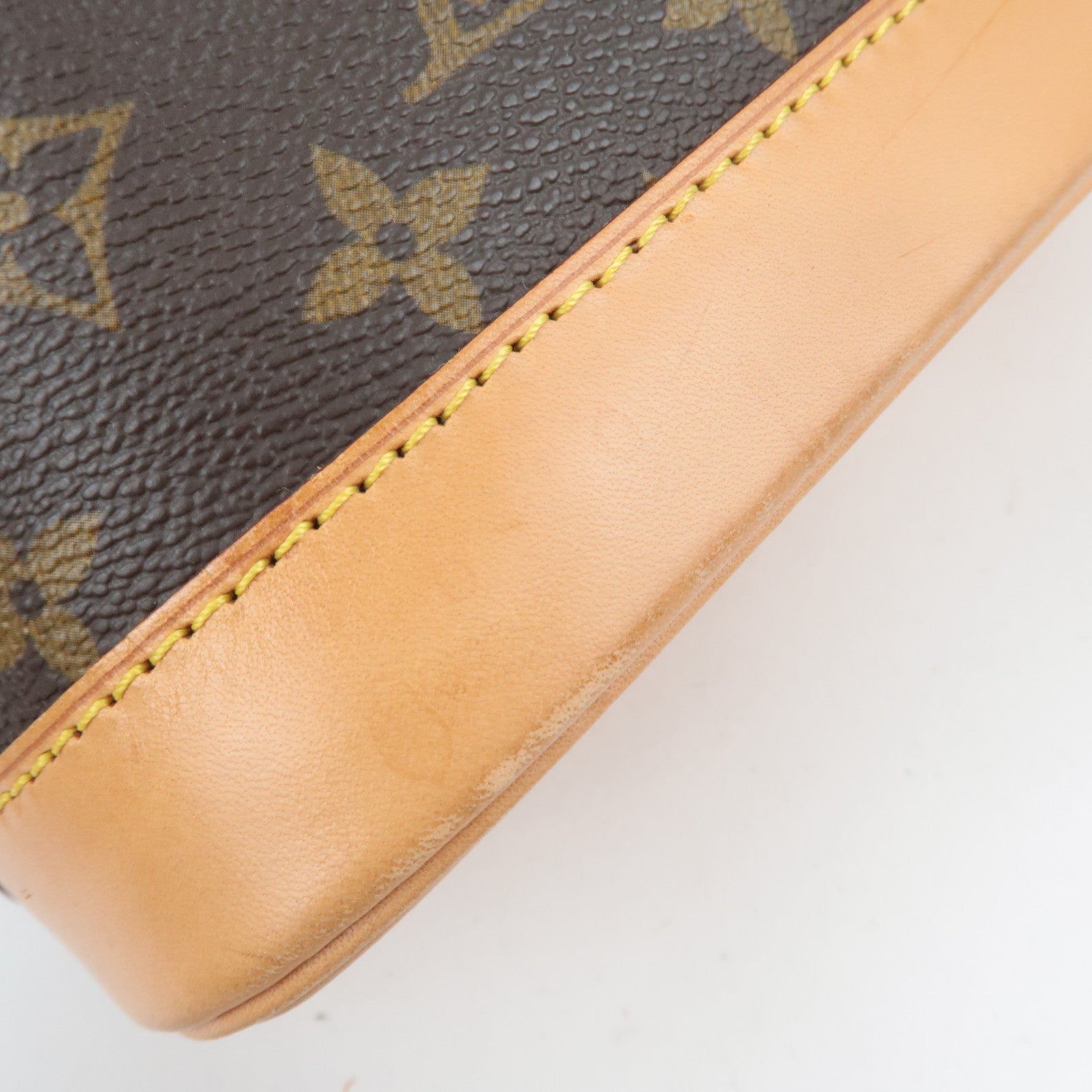 Louis Vuitton Monogram Alma Handbag M51130