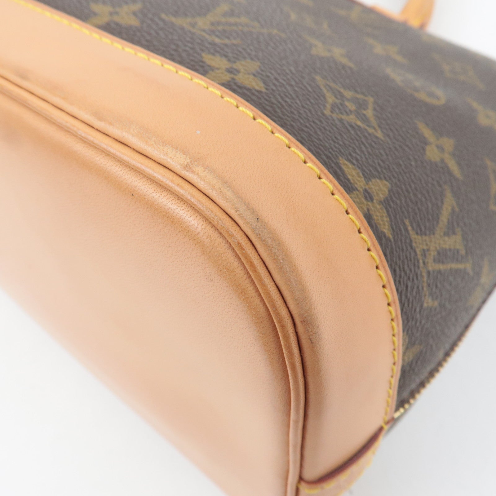 Louis Vuitton Monogram Alma Handbag M51130