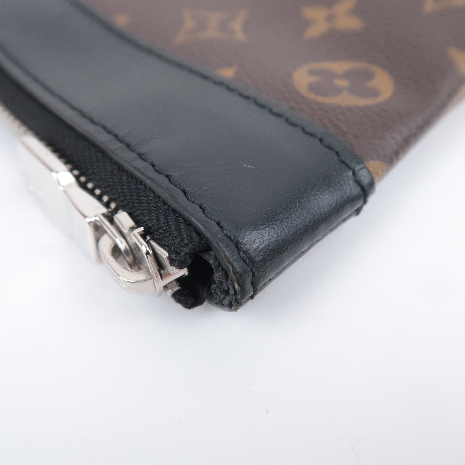 Louis Vuitton Monogram Macassar Pochette Discovery Clutch Bag M69411