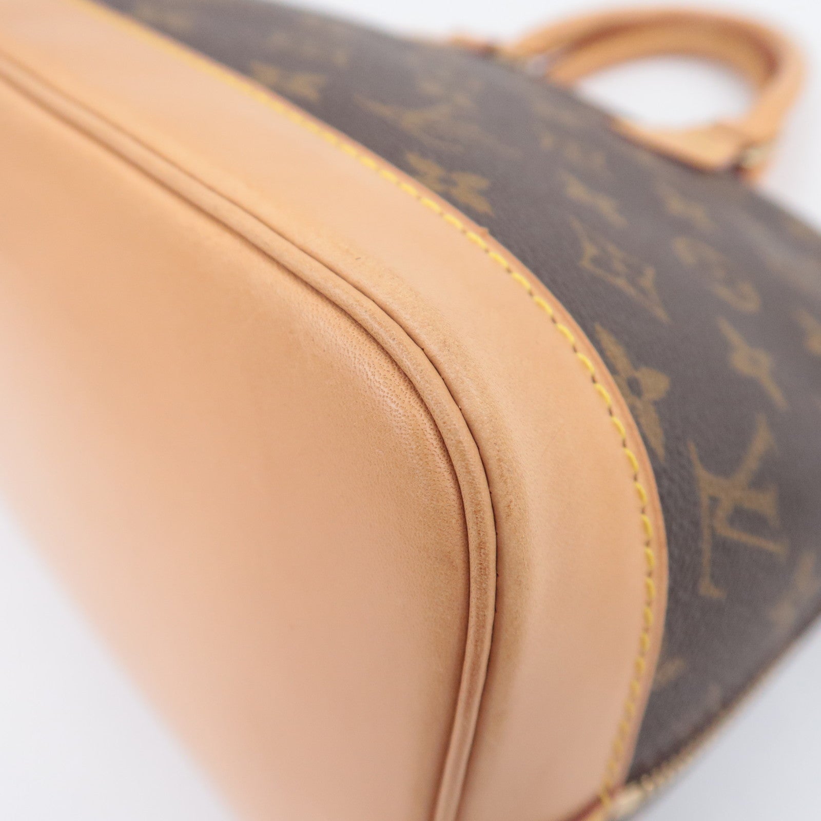 Louis Vuitton Monogram Alma Handbag M51130