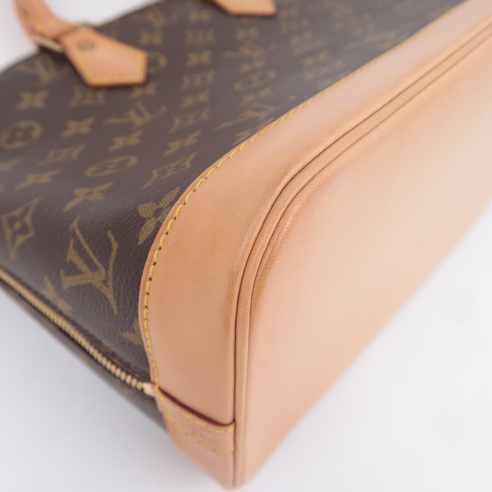 Louis Vuitton Monogram Alma Handbag M51130