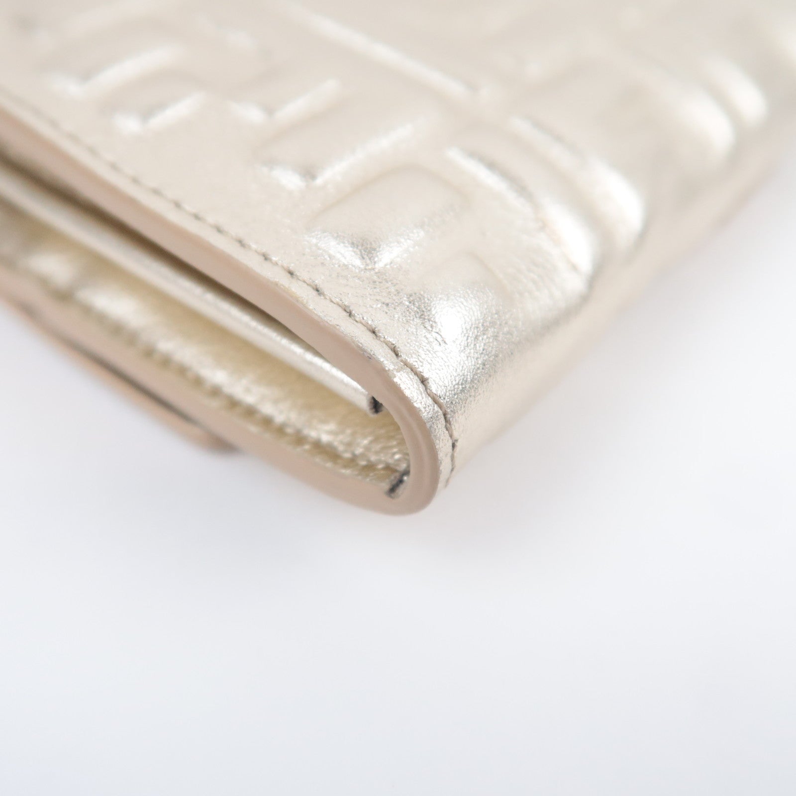 FENDI Zucca Embossed Leather WOC Gold 8M0365