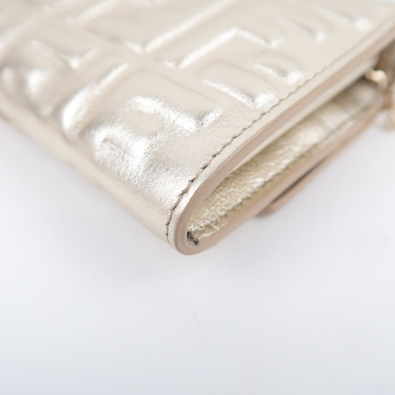FENDI Zucca Embossed Leather WOC Gold 8M0365