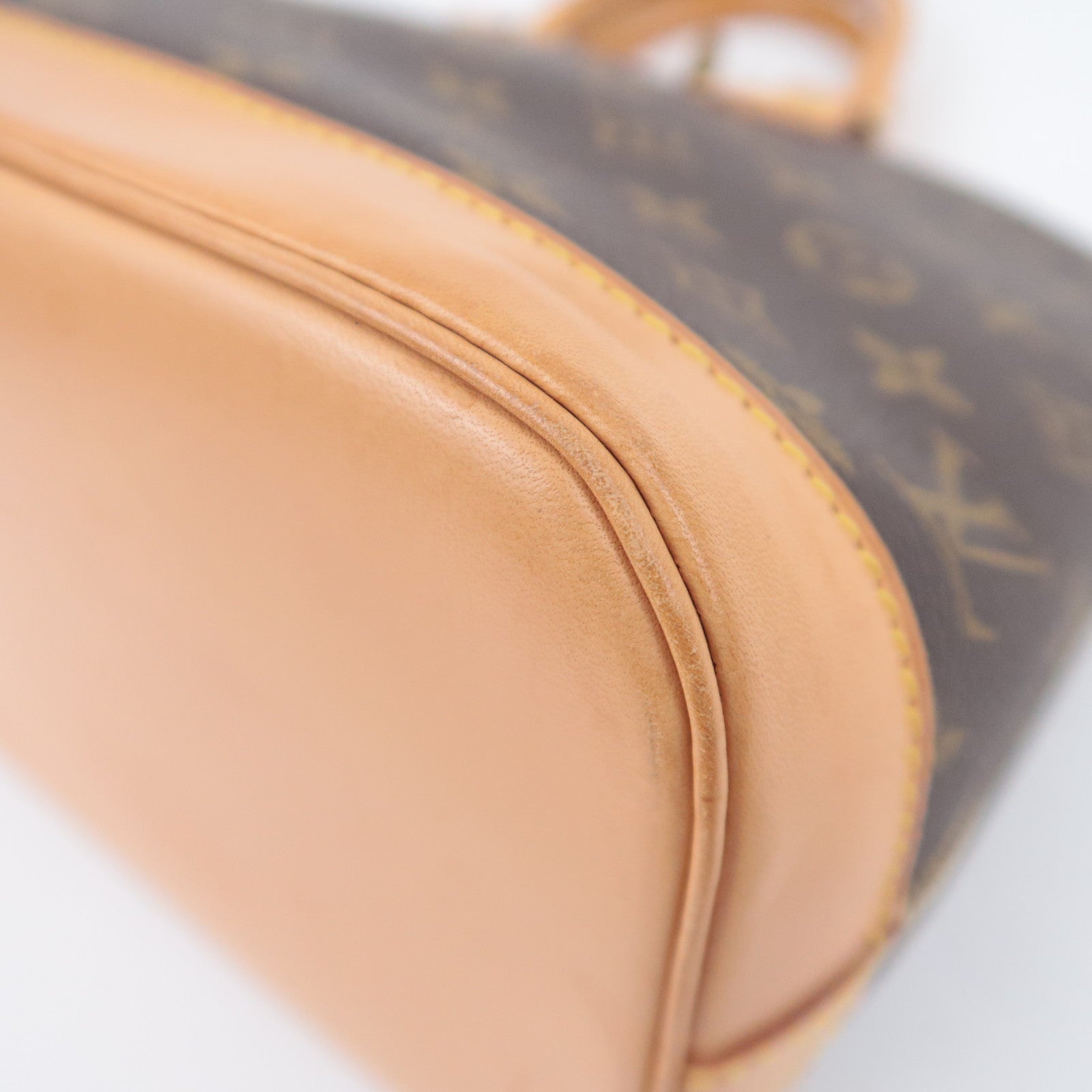 Louis Vuitton Monogram Alma Handbag M51130