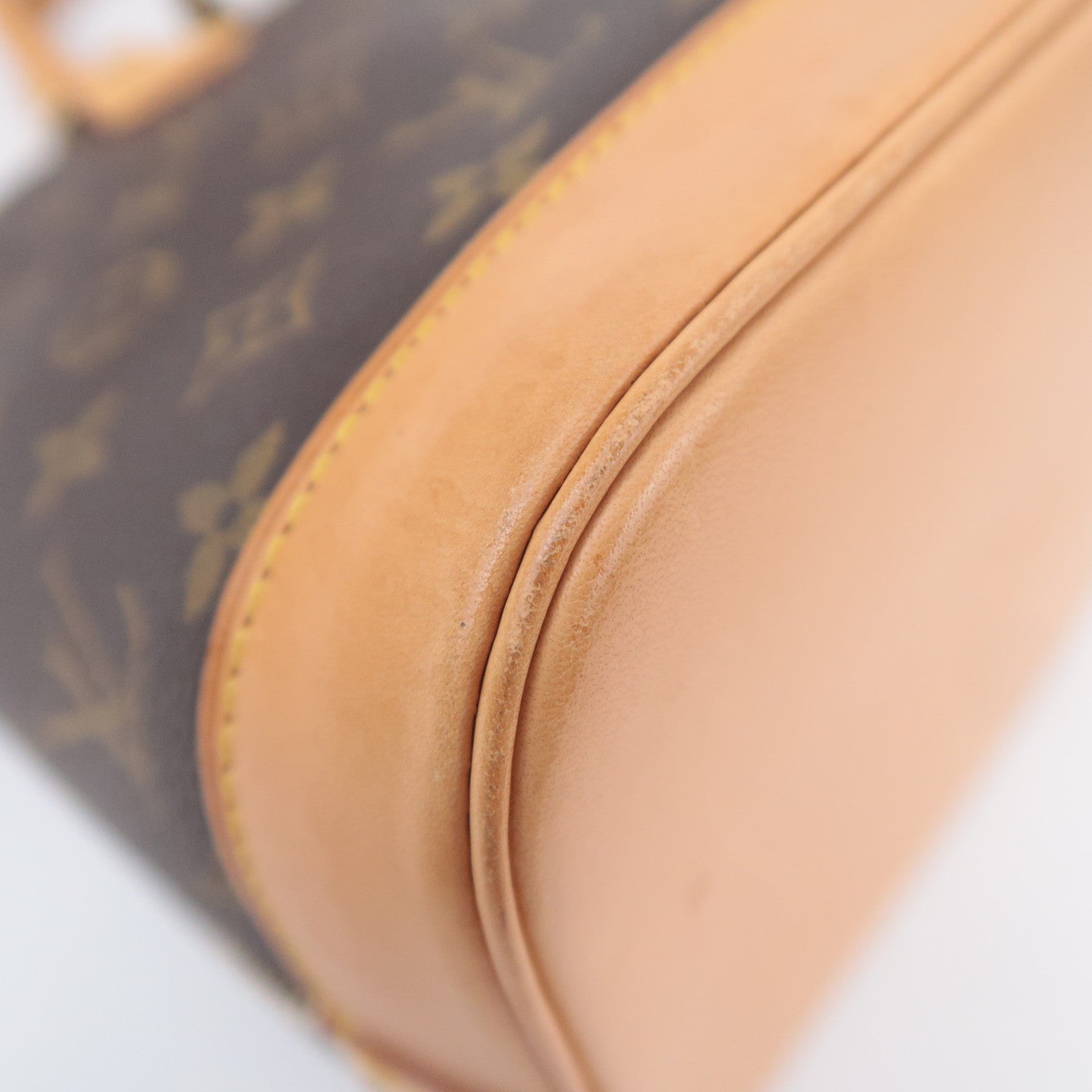 Louis Vuitton Monogram Alma Handbag M51130