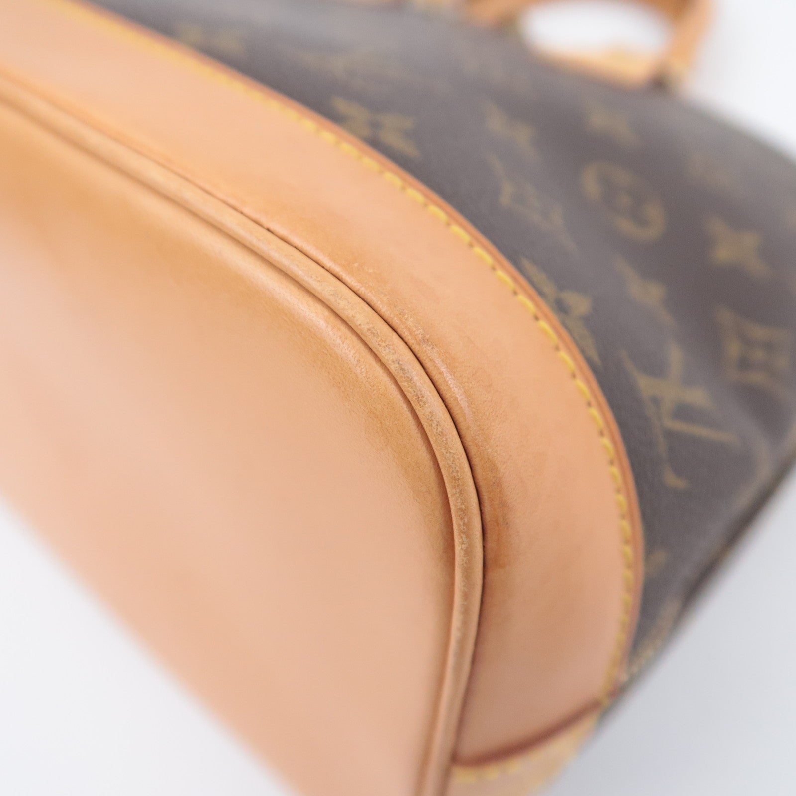 Louis Vuitton Monogram Alma Handbag M51130
