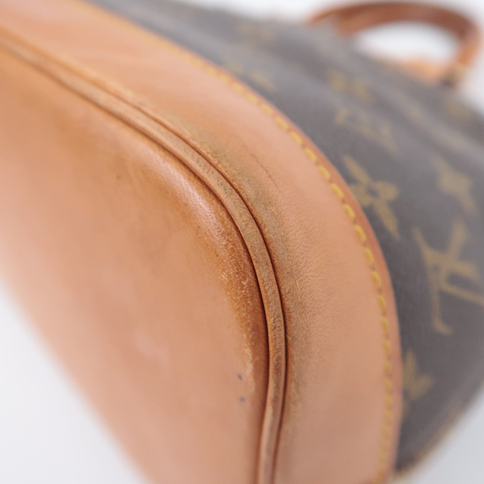 Louis Vuitton Monogram Alma Handbag M51130