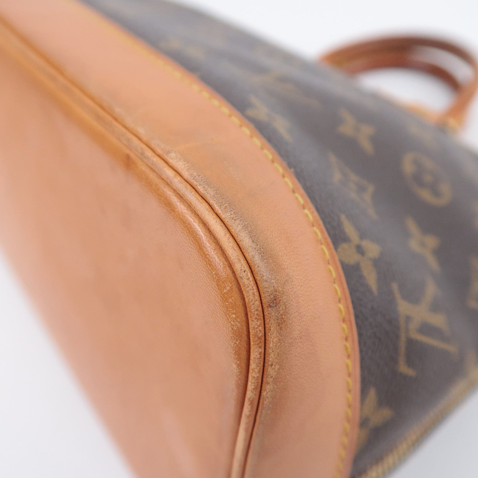 Louis Vuitton Monogram Alma Handbag M51130