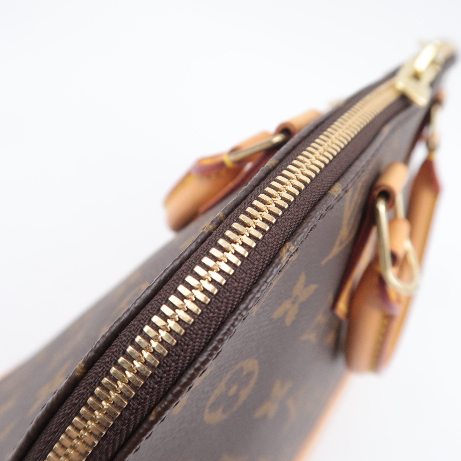 Louis Vuitton Monogram Alma Handbag M51130