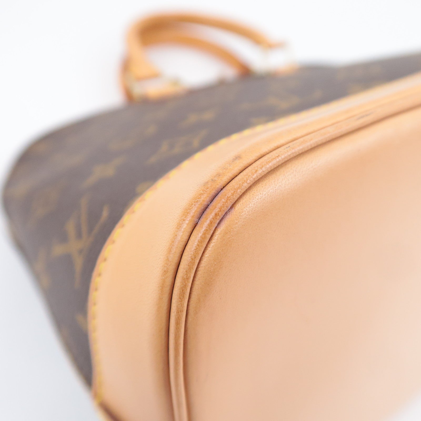 Louis Vuitton Monogram Alma Handbag M51130