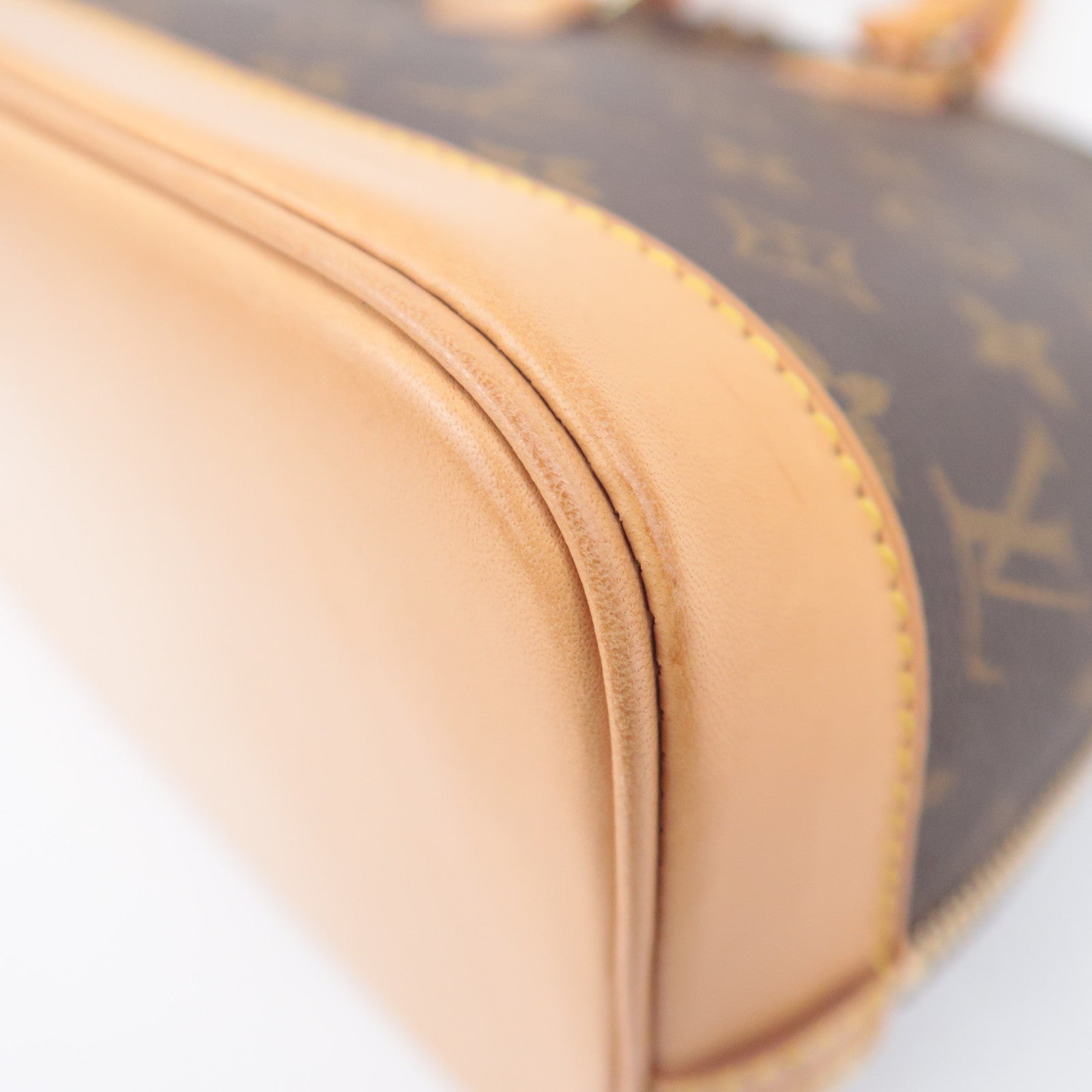 Louis Vuitton Monogram Alma Handbag M51130