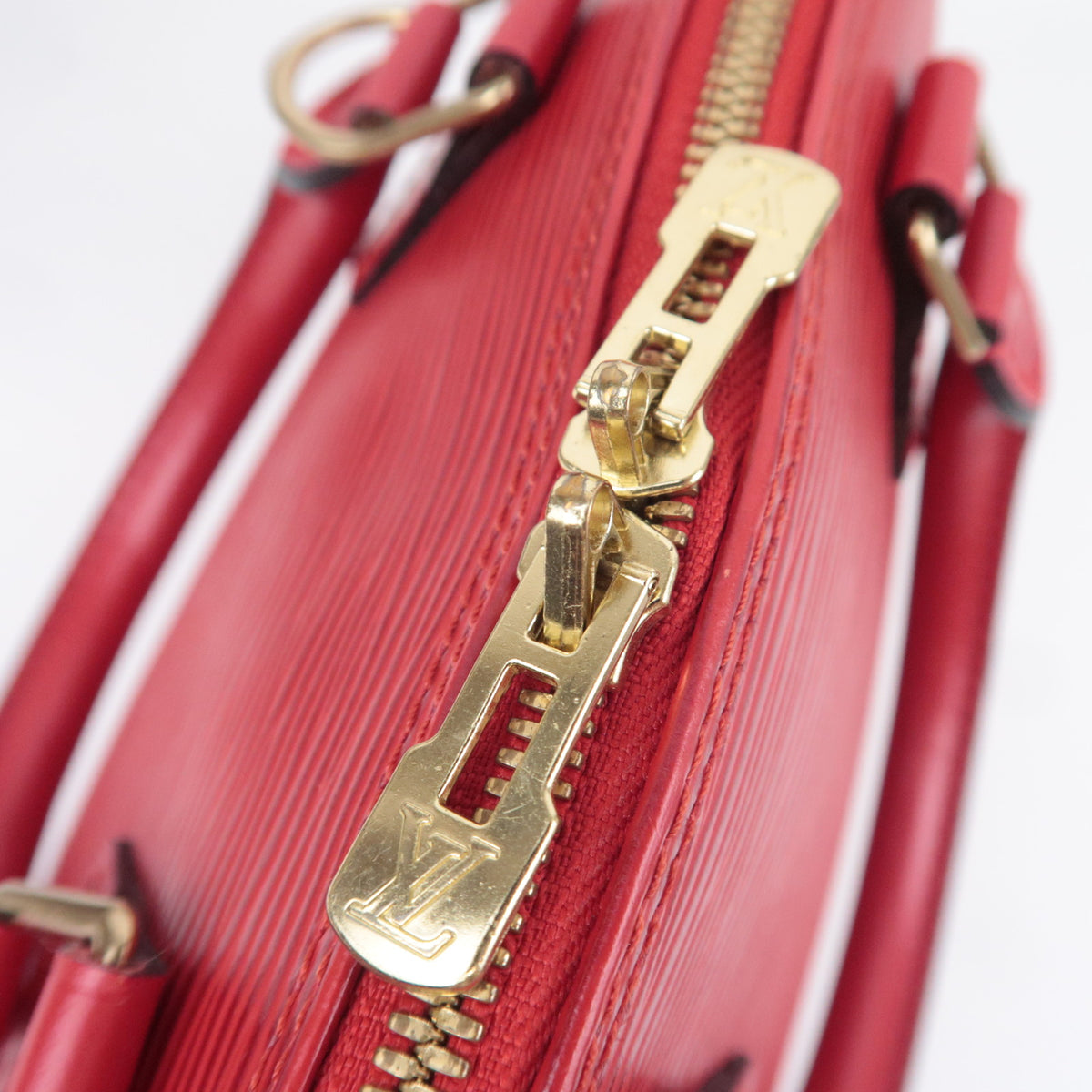 Louis Vuitton Epi Alma Handbag M52147