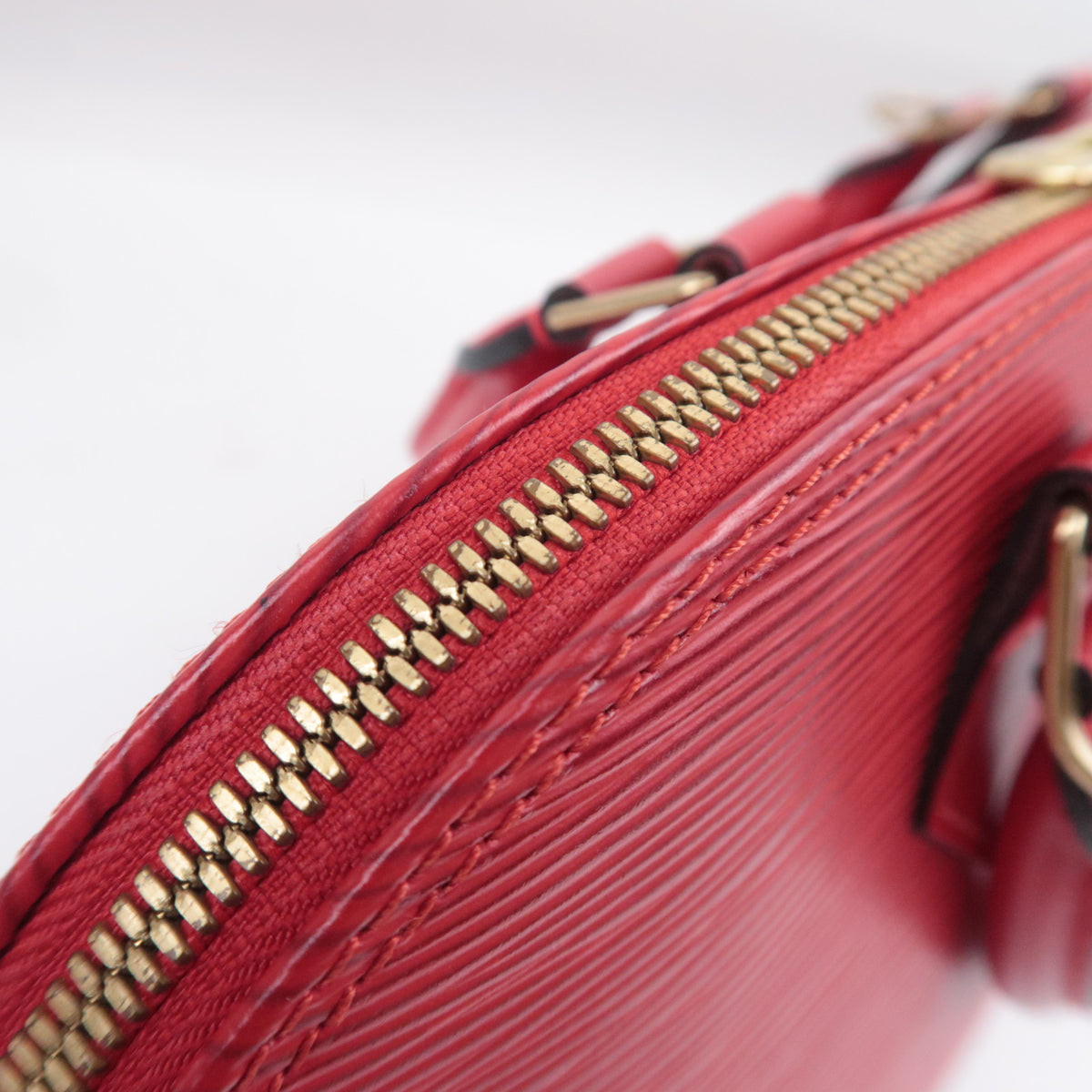 Louis Vuitton Epi Alma Handbag M52147